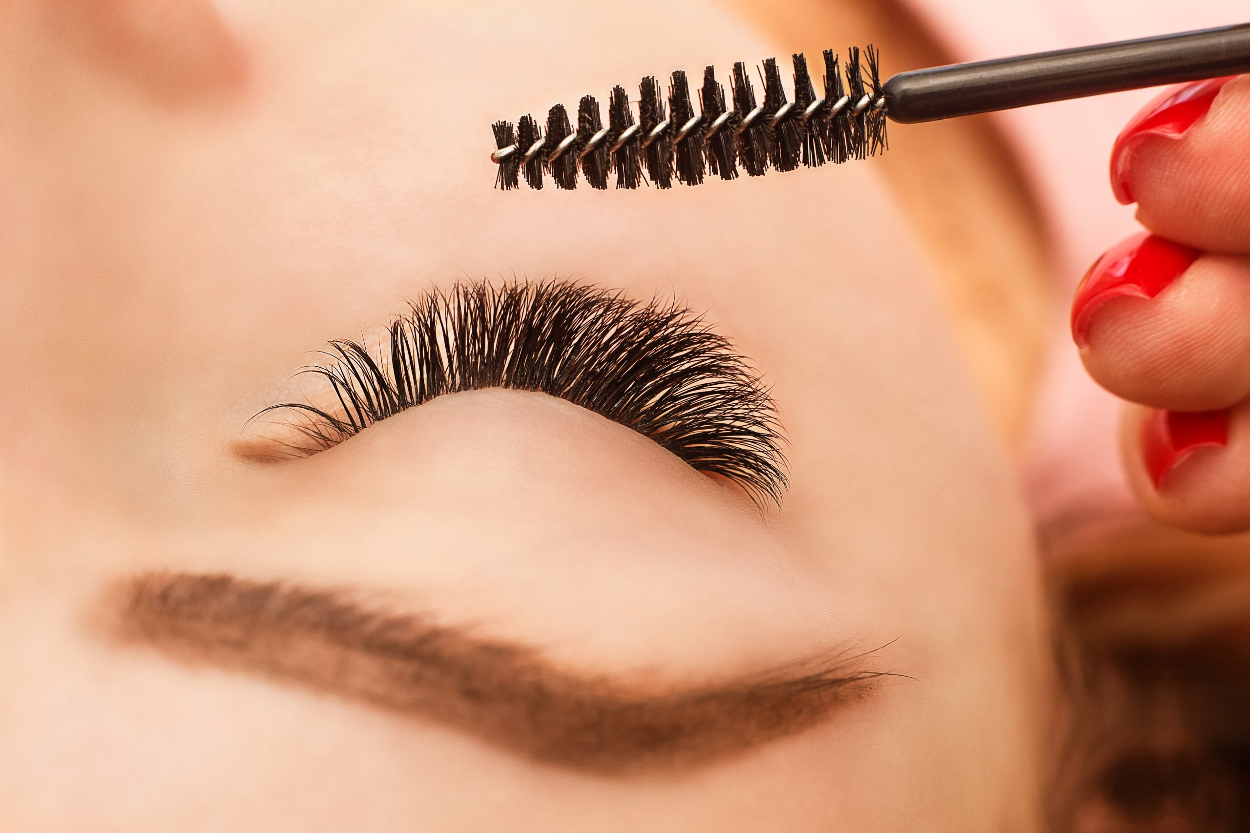 Eyelash Extension Procedure. Woman Eye with Long Eyelashes. Lashes. Close up, macro, selective focus