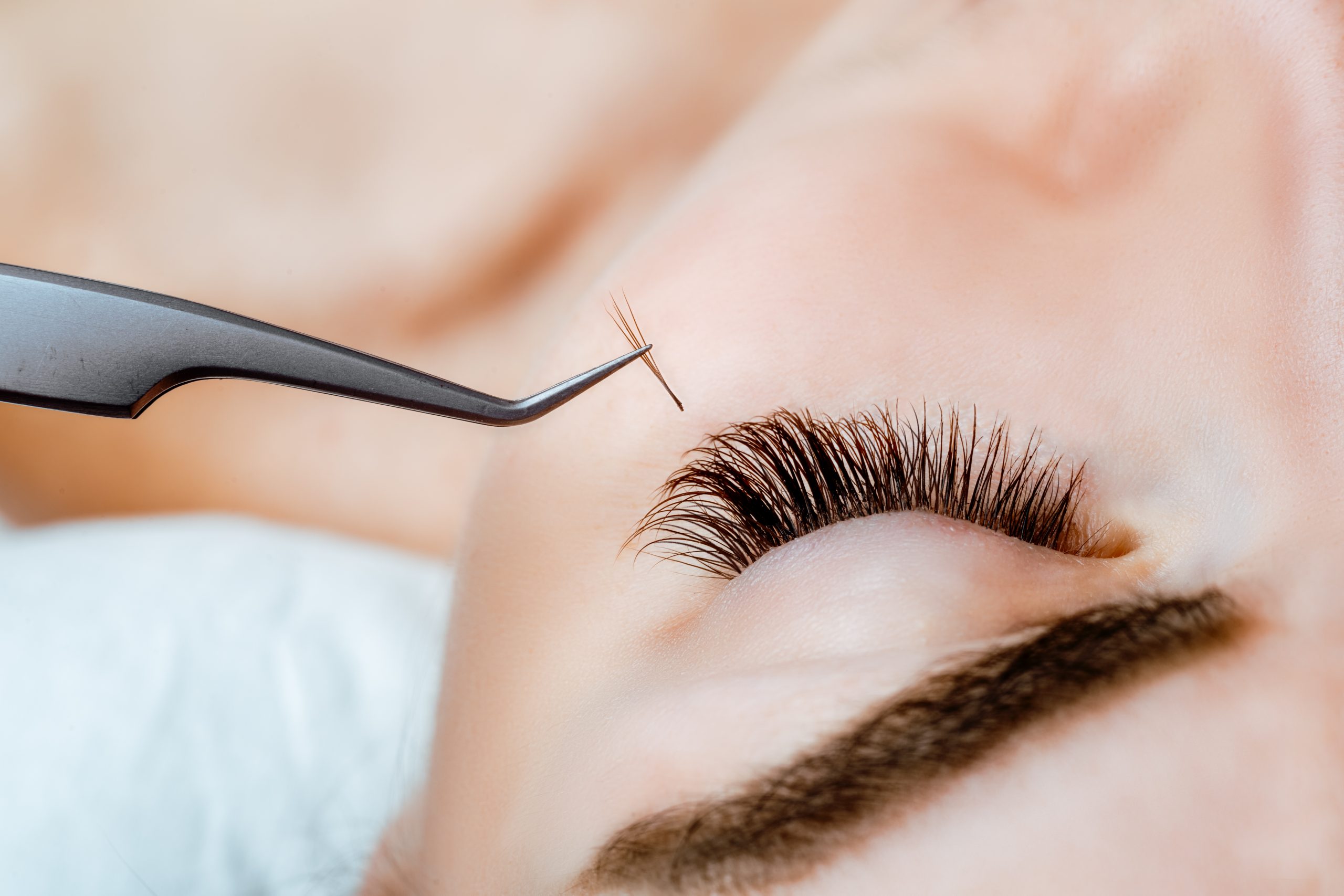 Woman Eye with Long Eyelashes. Eyelash Extension. Lashes. Close up, selected focus